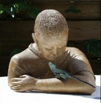 Kind met Kameleon op arm Kind met Kameleon op arm