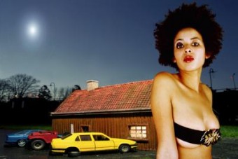 Three cars, a building and a girl. Three cars, a building and a girl.